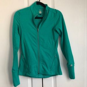 Roots zip up gorgeous green zip side pocket and 1 zip back pocket Sz S